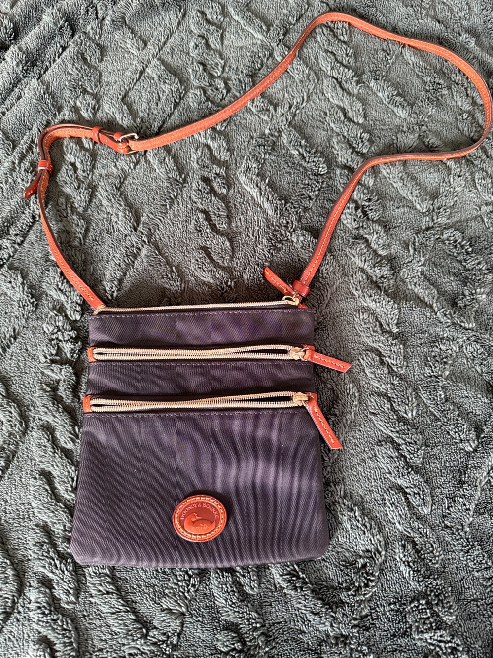 Dooney & Bourke black Crossbody with Tan Trim